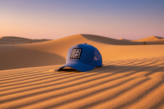 Blue DROP Cap – Desert Background